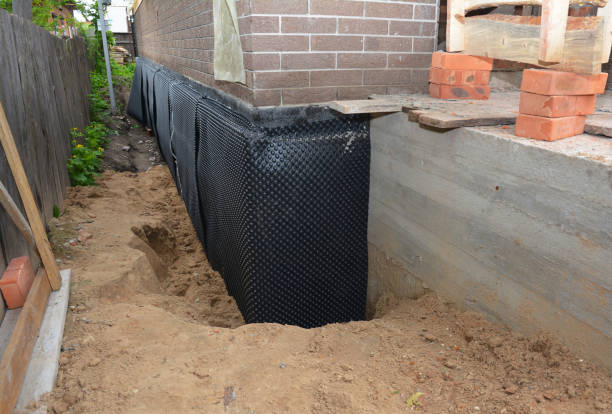 Happy homeowners after waterproofing job in Princeton Junction